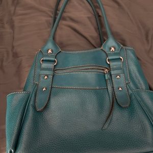 Teal purse used learher